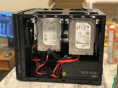 hard drives stacked in a small computer